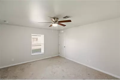 2906 26th St SW, Lehigh Acres, FL 33976 - Photo 17