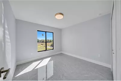 2512 29th St SW, Lehigh Acres, FL 33976 - Photo 17