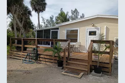 7867 Raymary St, Bokeelia, FL 33922 - Photo 1