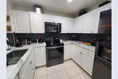 3952 Pomodoro Cir #102, Cape Coral, FL 33909 - Photo 1