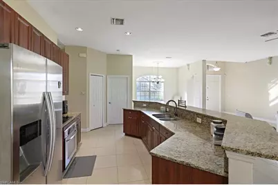 771 Dudley Ave S, Lehigh Acres, FL 33974 - Photo 9