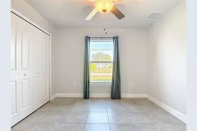 1021 Cedartree Ave, Lehigh Acres, FL 33971 - Photo 19