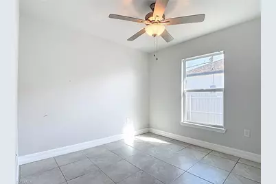 1021 Cedartree Ave, Lehigh Acres, FL 33971 - Photo 27