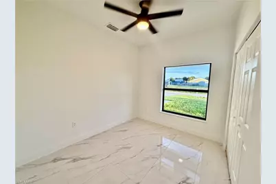 684 Kingsbury St E, Lehigh Acres, FL 33974 - Photo 35