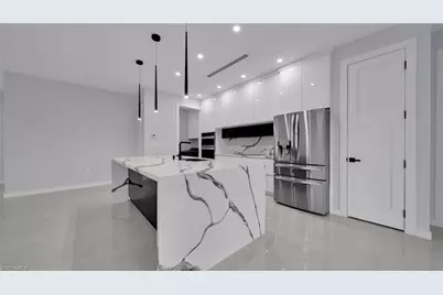 910 NW 36th Pl, Cape Coral, FL 33993 - Photo 11