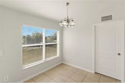 2703 19th St SW, Lehigh Acres, FL 33976 - Photo 11