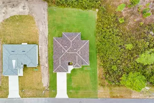 724 Giorgio Ave S, Lehigh Acres, FL 33974 - Photo 33