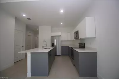 1260 Milwaukee Blvd #1260, Lehigh Acres, FL 33974 - Photo 7