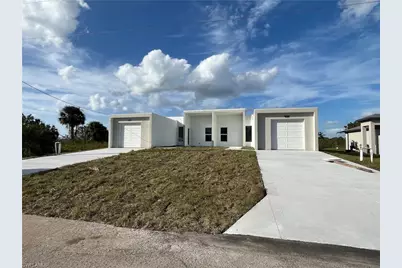 165 Pennfield St, Lehigh Acres, FL 33974 - Photo 1