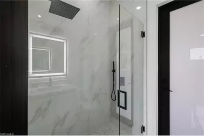 2422 Nelson Rd N, Cape Coral, FL 33993 - Photo 39