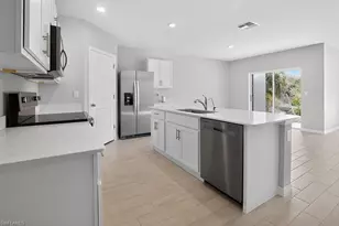 553 Kingsbury Ln, Lehigh Acres, FL 33974 - Photo 9