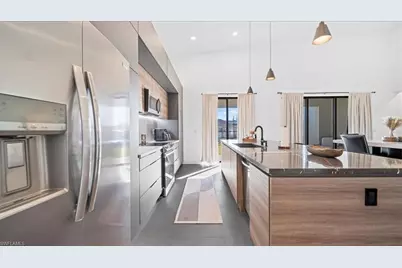 1017 NE 4th Pl, Cape Coral, FL 33909 - Photo 11