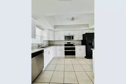 706 SE 13th Ct #J, Cape Coral, FL 33990 - Photo 9