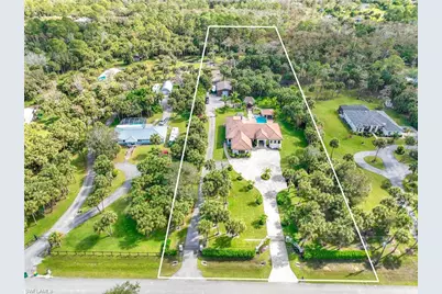 214 9th St NW, Naples, FL 34120 - Photo 1