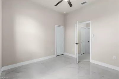 2606 25th St SW, Lehigh Acres, FL 33976 - Photo 23