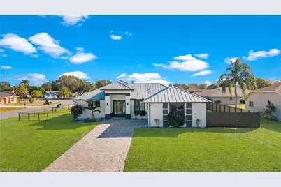 24 Crestwood Cir S, Lehigh Acres, FL 33936 - Photo 1