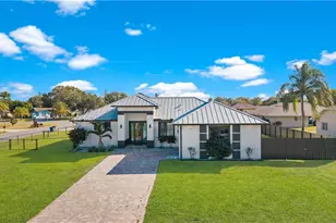 24 Crestwood Cir S, Lehigh Acres, FL 33936 - Photo 1