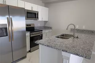 1406 SE 1st Pl, Cape Coral, FL 33990 - Photo 3