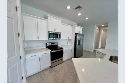 630 Falls Ln, Lehigh Acres, FL 33974 - Photo 17