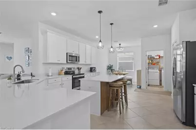 9341 Aqua Overlook Ct, Lehigh Acres, FL 33936 - Photo 15