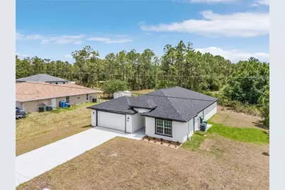 365 Woodburn Dr, Lehigh Acres, FL 33972 - Photo 23