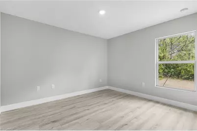 365 Woodburn Dr, Lehigh Acres, FL 33972 - Photo 19