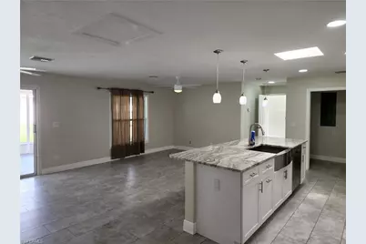 100 Roosevelt Ave, Lehigh Acres, FL 33936 - Photo 5