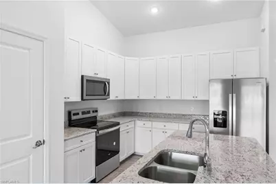 1044 Cheney Ave S, Lehigh Acres, FL 33974 - Photo 5