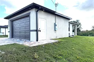 3115 26th St SW, Lehigh Acres, FL 33976 - Photo 1
