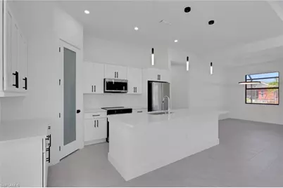 1723 SW 3rd Ter, Cape Coral, FL 33991 - Photo 7