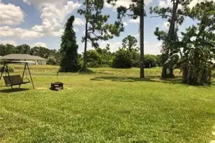 561 Foxcreek Dr, Lehigh Acres, FL 33974 - Photo 11