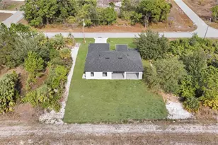 1002 Kanuga St E, Lehigh Acres, FL 33974 - Photo 49
