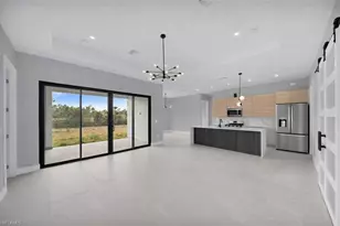 1002 Kanuga St E, Lehigh Acres, FL 33974 - Photo 7