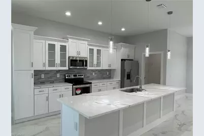 721 NE 11th Ter, Cape Coral, FL 33909 - Photo 9