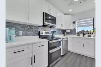 1027 SE 46th Ln #2A, Cape Coral, FL 33904 - Photo 5