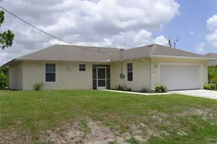 551 Genoa Ave S, Lehigh Acres, FL 33974 - Photo 1