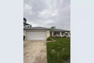 1106 Summa Blvd, Lehigh Acres, FL 33974 - Photo 1