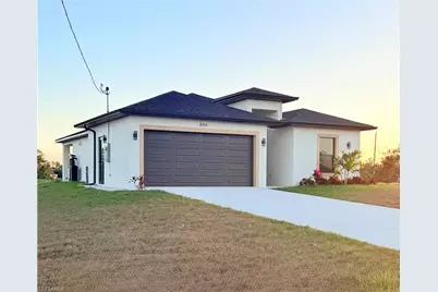 844 Millpond St E, Lehigh Acres, FL 33974 - Photo 1