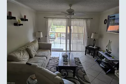 1210 Wildwood Lakes Blvd #203, Naples, FL 34104 - Photo 1