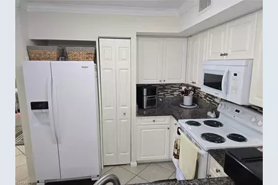 1210 Wildwood Lakes Blvd #203, Naples, FL 34104 - Photo 21