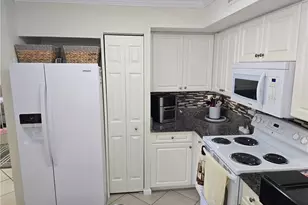 1210 Wildwood Lakes Blvd, Naples, FL 34104 - Photo 21