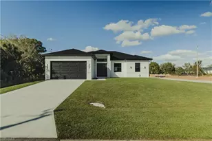 765 Chambers St E, Lehigh Acres, FL 33974 - Photo 1