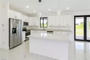 612 Ames St E, Lehigh Acres, FL 33974 - Photo 5