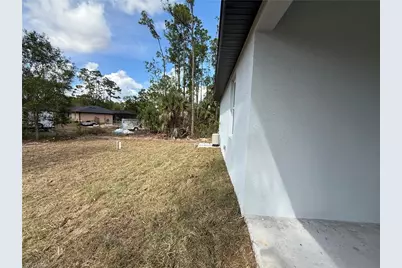 106 Moore Ave S, Lehigh Acres, FL 33974 - Photo 21