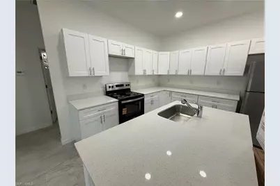 106 Moore Ave S, Lehigh Acres, FL 33974 - Photo 3