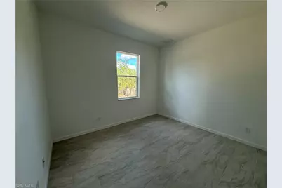 106 Moore Ave S, Lehigh Acres, FL 33974 - Photo 11