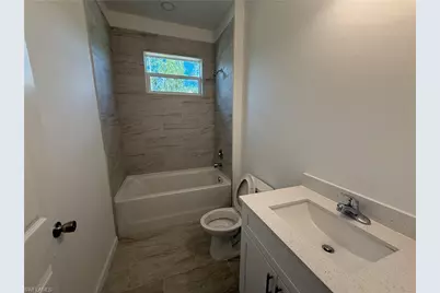 106 Moore Ave S, Lehigh Acres, FL 33974 - Photo 13