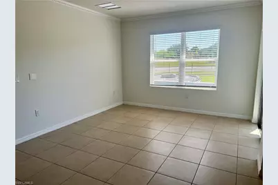 10293 Silver Pond Ln, Lehigh Acres, FL 33936 - Photo 27