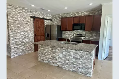 10293 Silver Pond Ln, Lehigh Acres, FL 33936 - Photo 17