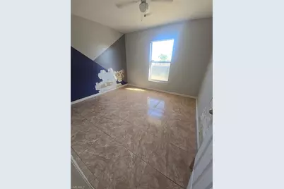 1010 Alabama Rd S, Lehigh Acres, FL 33974 - Photo 11